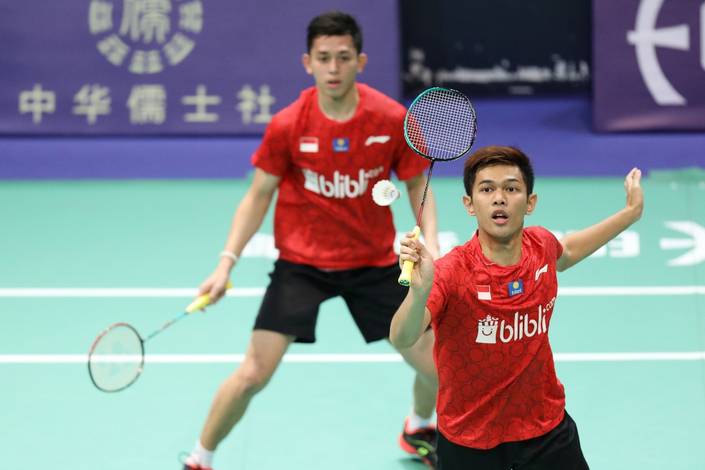 Fajar Alfian/Muhammad Rian Ardianto (Indonesia) bersiap menyambar pengembalian. Fajar Alfian/Muhammad Rian Ardianto (Indonesia) bersiap menyambar pengembalian.