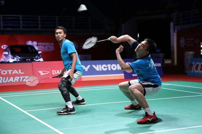 Hendra Setiawan/Mohammad Ahsan (Indonesia) mengembalikan shuttlecock. Hendra Setiawan/Mohammad Ahsan (Indonesia) mengembalikan shuttlecock.