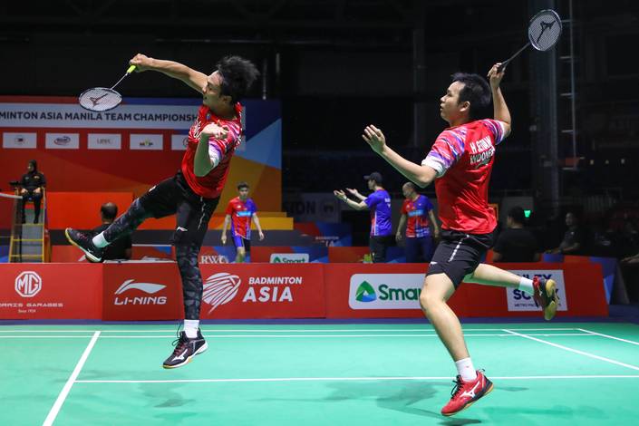 Hendra Setiawan/Mohammad Ahsan (Indonesia) melepaskan serangan. Hendra Setiawan/Mohammad Ahsan (Indonesia) melepaskan serangan.