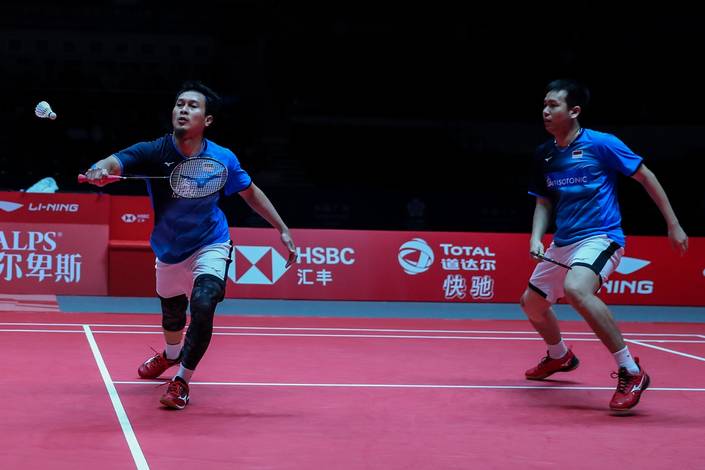 Hendra Setiawan/Mohammad Ahsan (Indonesia) menyambut pengembalian. Hendra Setiawan/Mohammad Ahsan (Indonesia) menyambut pengembalian.