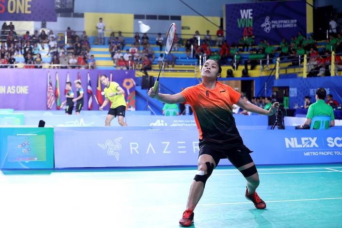 Gregoria Mariska Tunjung (Indonesia) mengembalikan shuttlecock. Gregoria Mariska Tunjung (Indonesia) mengembalikan shuttlecock.